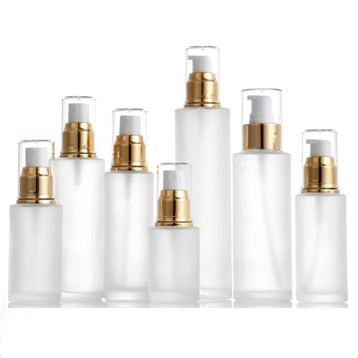 Glass toner bottles  with lotion pumps image